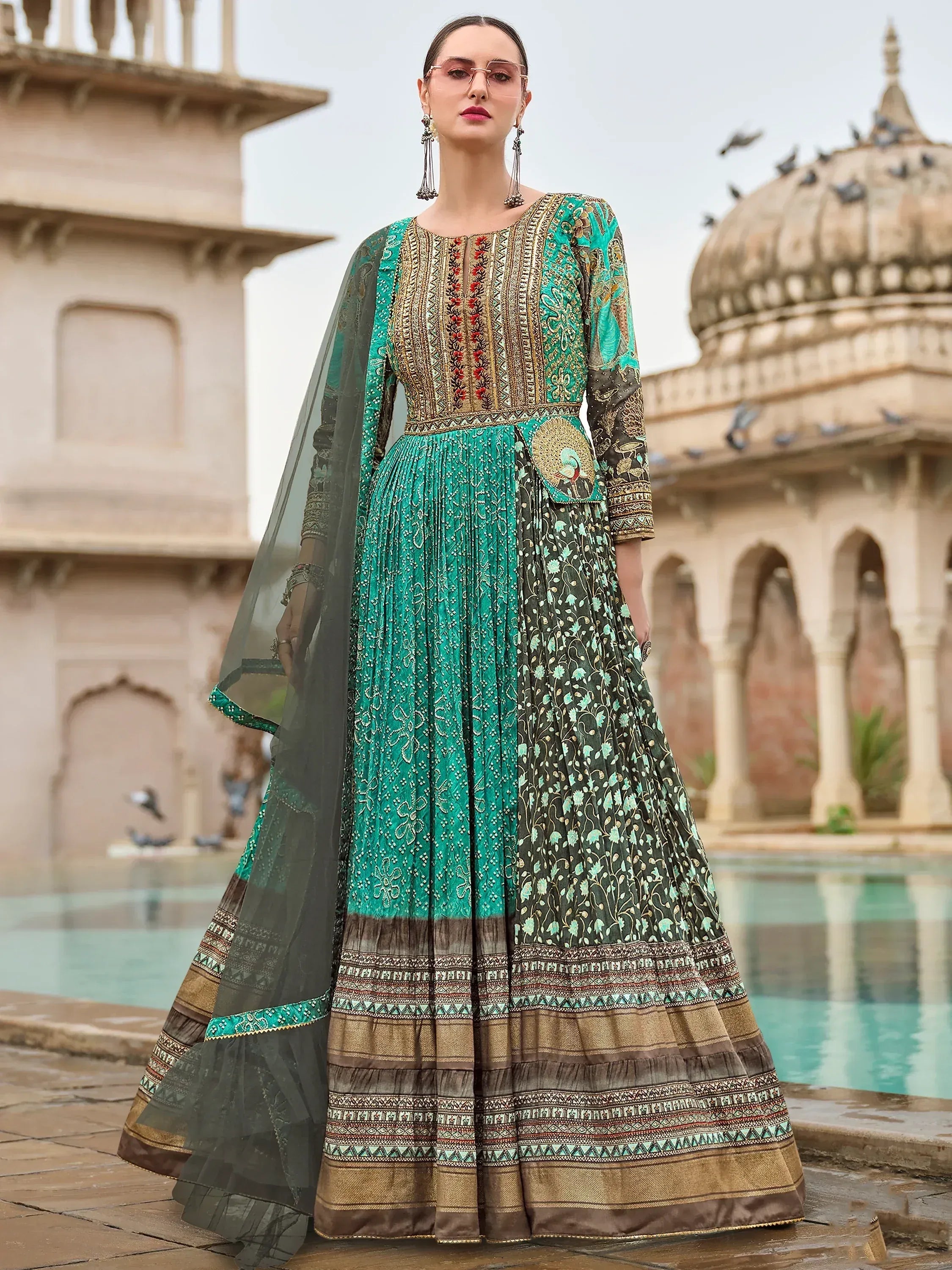Emerald green and olive anarkali suit with intricate embroidery, perfect for Indian ethnic wear occasions.