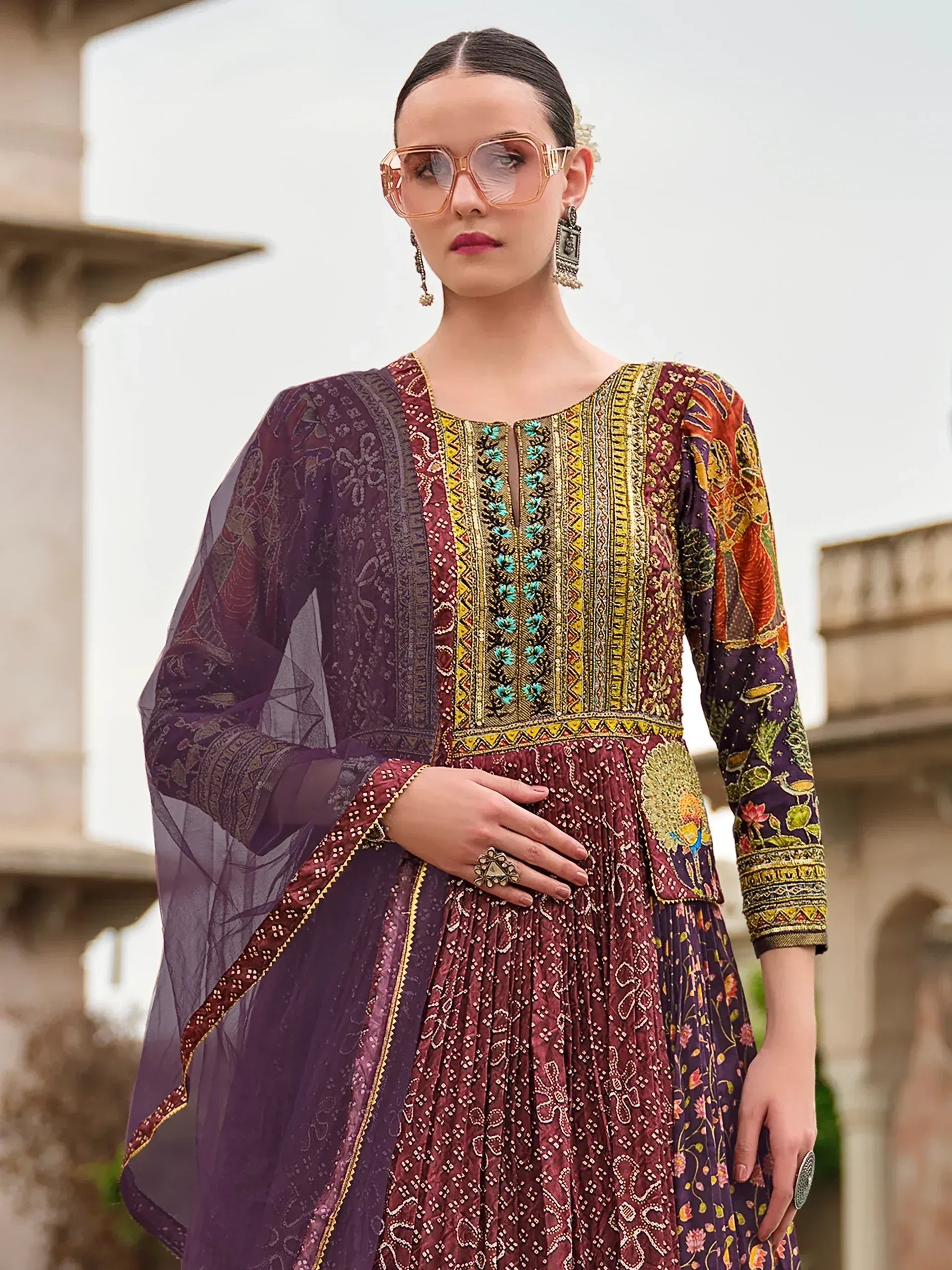 Elegant maroon and purple embroidered anarkali suit with sheer dupatta, perfect for Indian ethnic occasions.