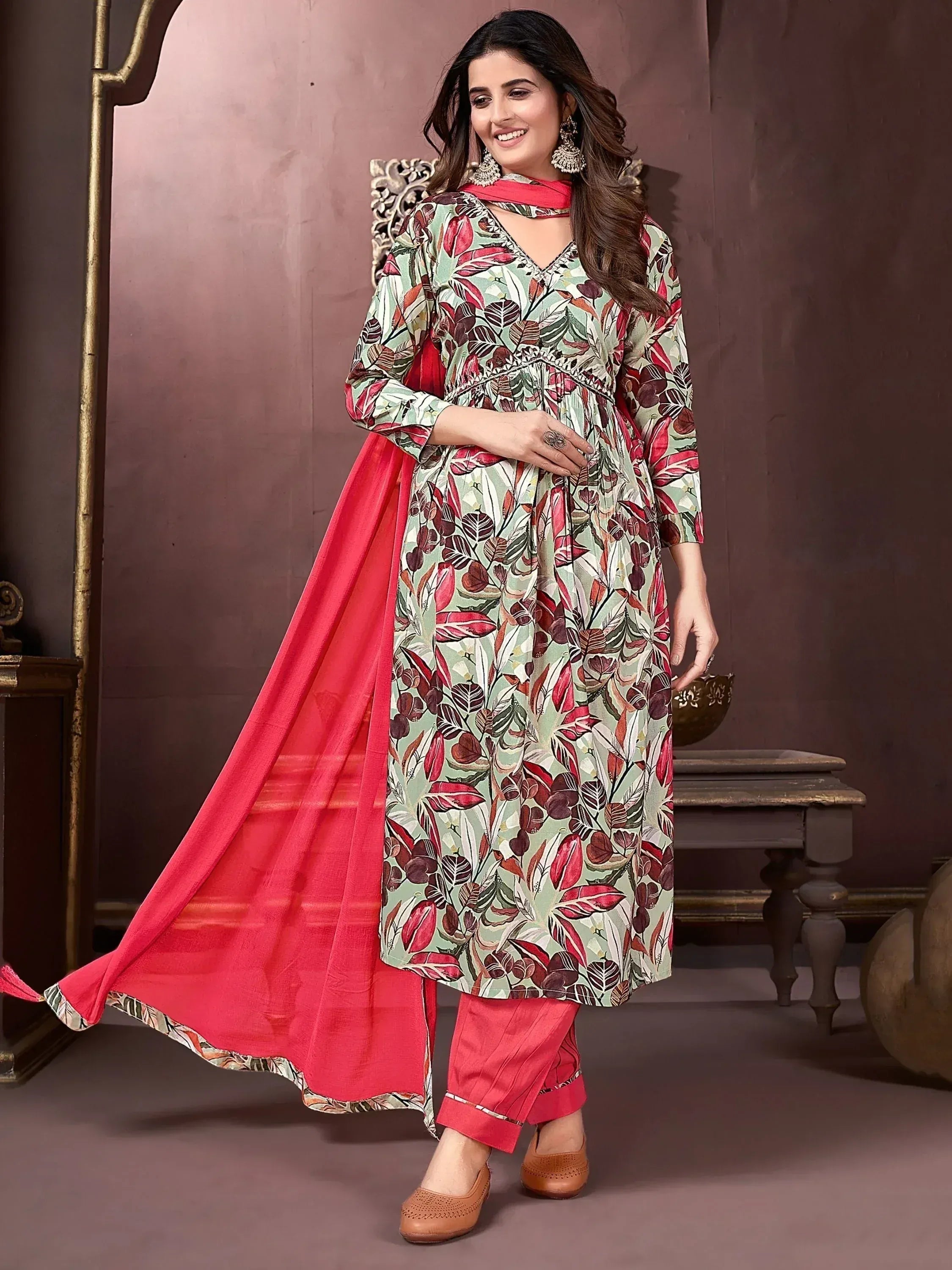 Floral print ethnic salwar kameez with pink dupatta and pants, perfect for Indian wear occasions