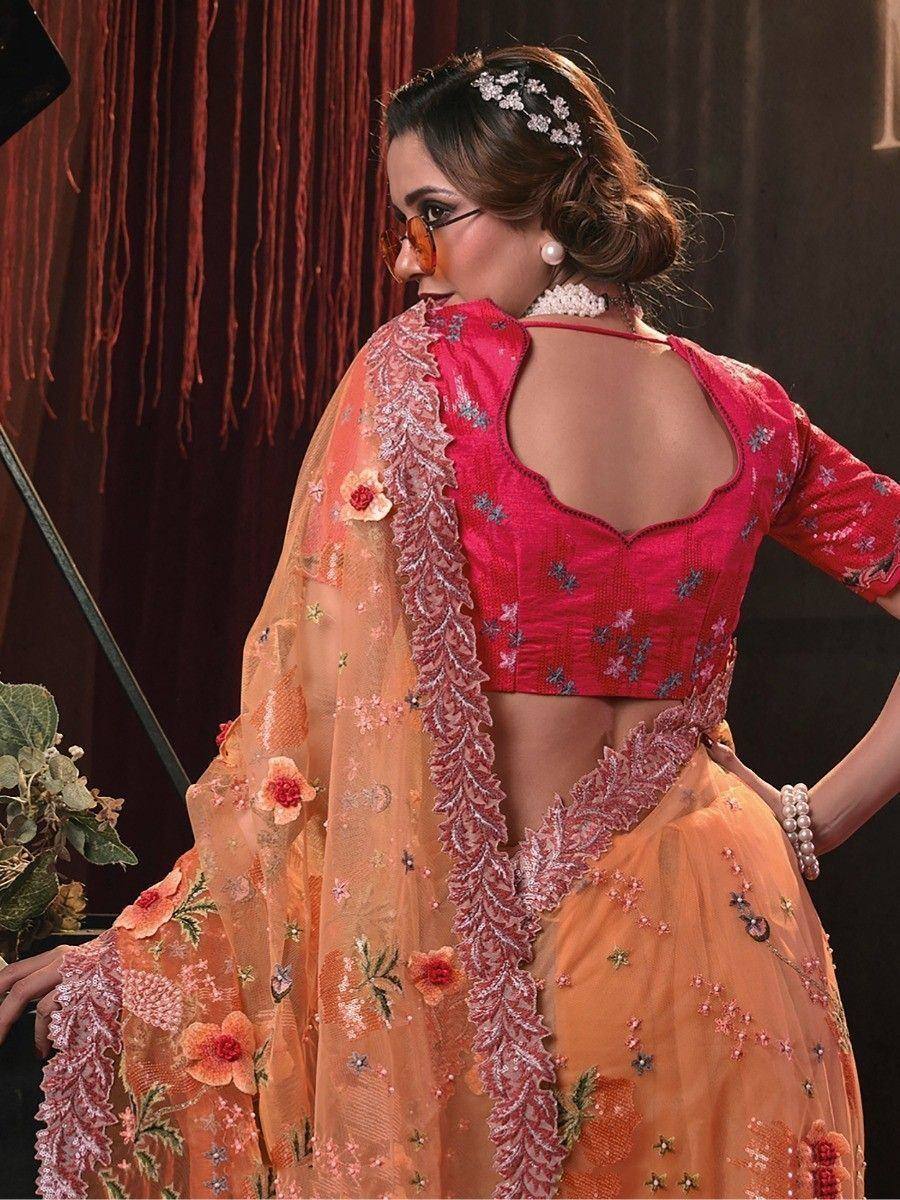 Pink embroidered blouse with back cutout, peach floral lehenga choli, perfect for Indian ethnic wear occasions