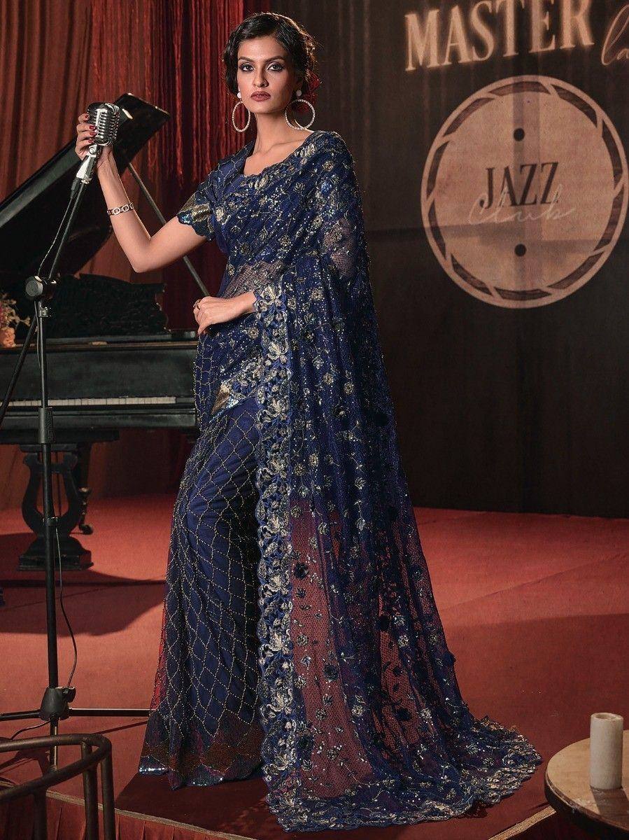 Elegant navy blue embroidered saree with gold detailing, perfect for Indian ethnic events and parties.