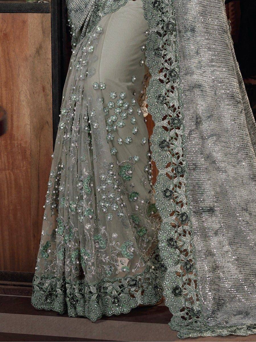 Elegant grey lehenga with green floral embroidery and sequin dupatta, perfect for Indian ethnic wear.