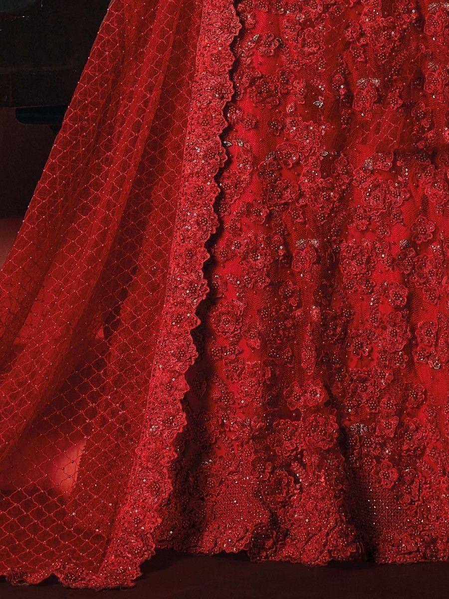 Red embroidered lehenga with floral lace and sequin detailing, perfect for Indian ethnic wear occasions.