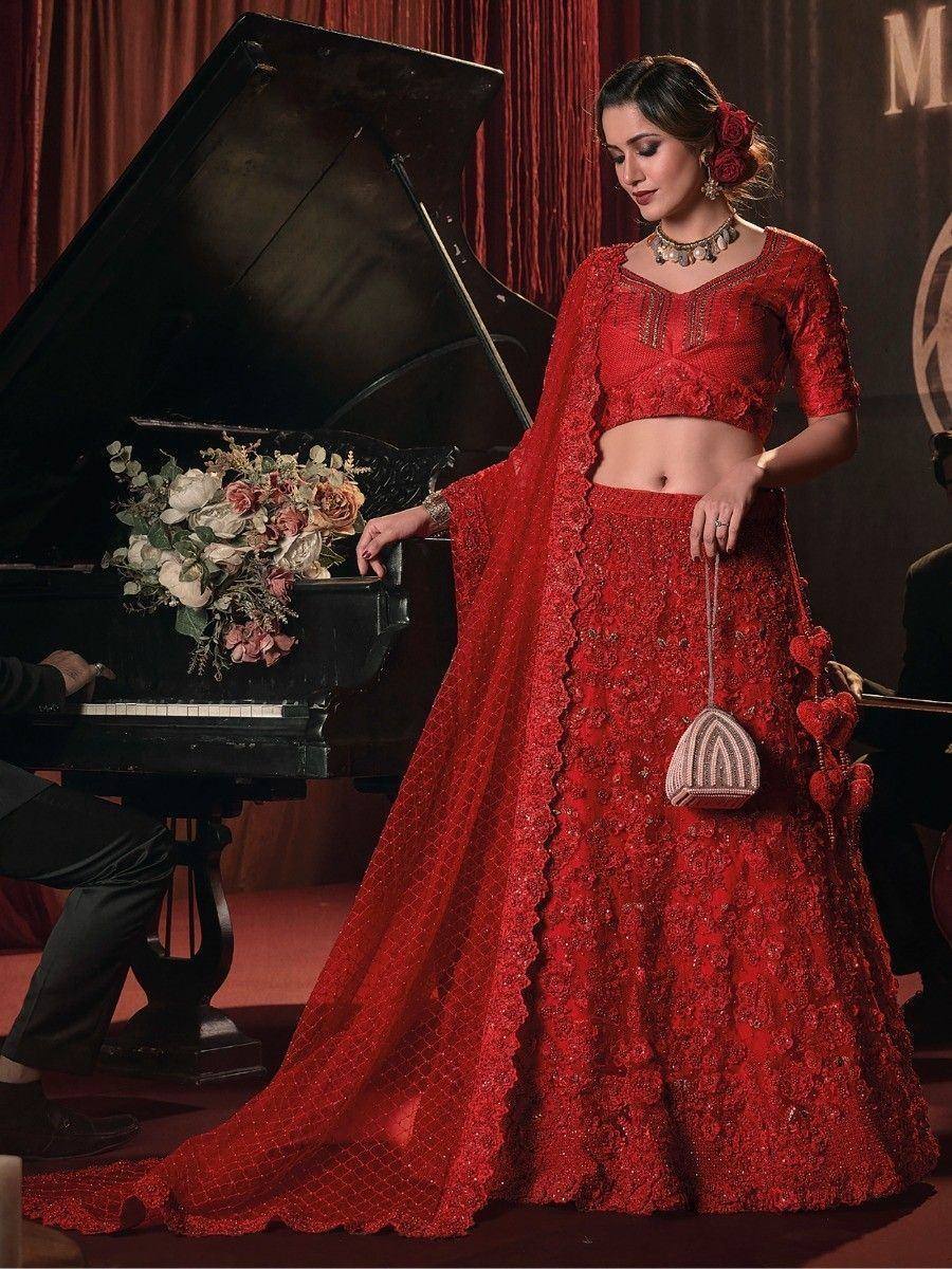Red embroidered lehenga choli with dupatta, perfect for weddings and festive occasions