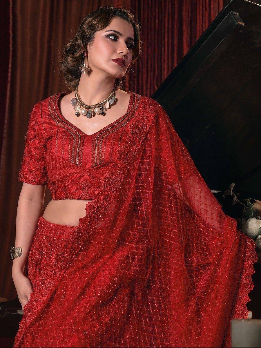 Red embroidered lehenga choli with net dupatta, ethnic Indian wear for weddings and parties