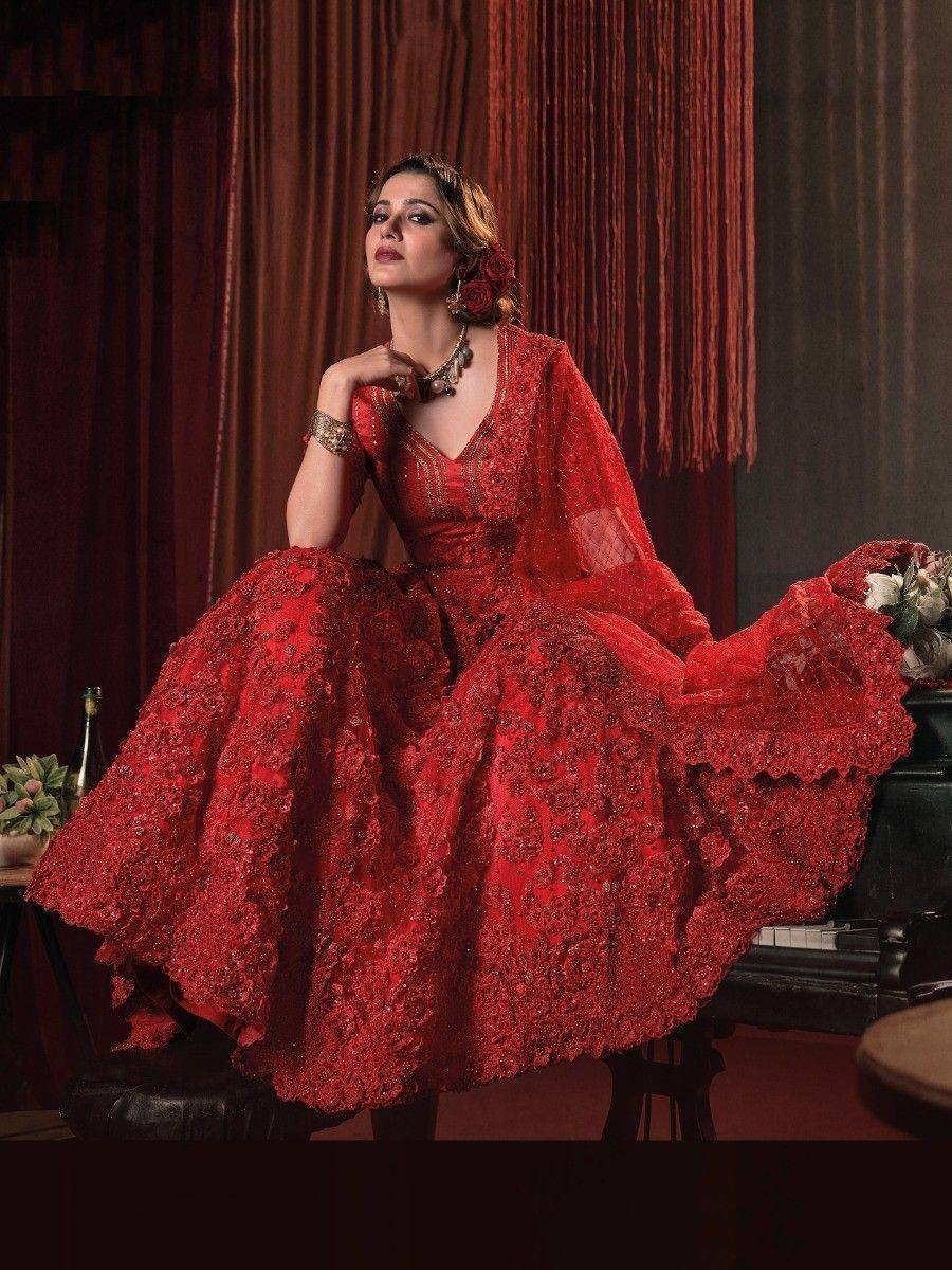 Red embroidered lehenga choli with floral detailing, perfect for Indian weddings and festive occasions.