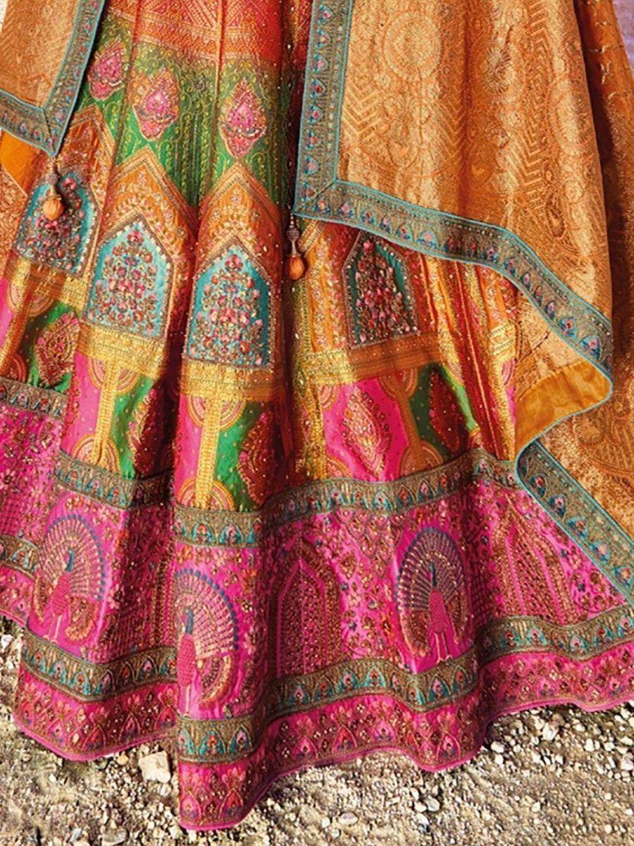 Vibrant Indian lehenga with peacock motifs, intricate embroidery, and rich colors for ethnic wear