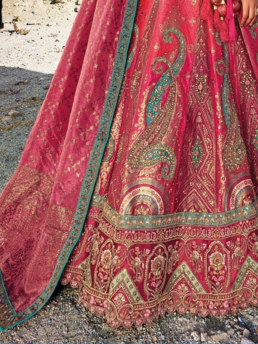 Pink designer lehenga with gold and teal embroidery, ethnic Indian wedding wear