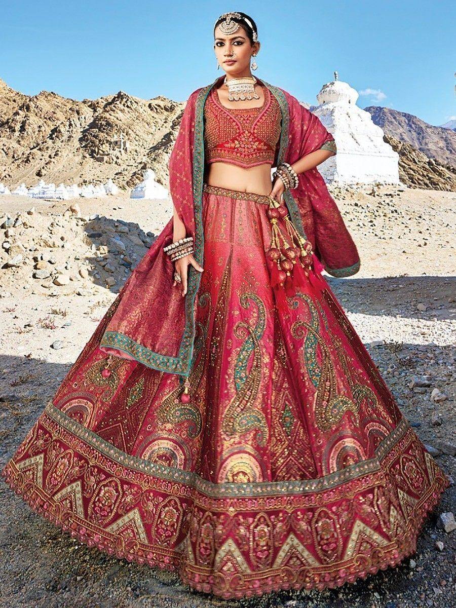 Red embroidered lehenga choli with dupatta, perfect for Indian weddings and festive occasions
