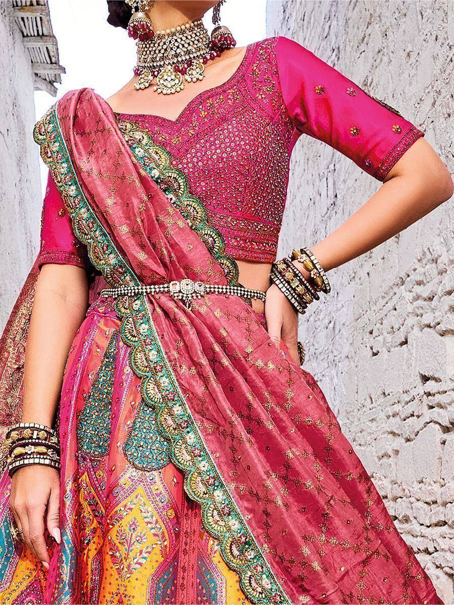 Pink embroidered lehenga choli with colorful dupatta, traditional Indian ethnic wear for women