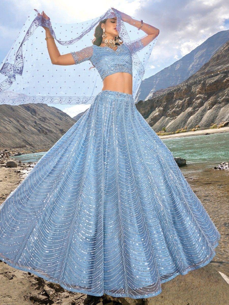 Blue sequin lehenga choli with sheer dupatta, perfect for Indian ethnic wear and festive occasions