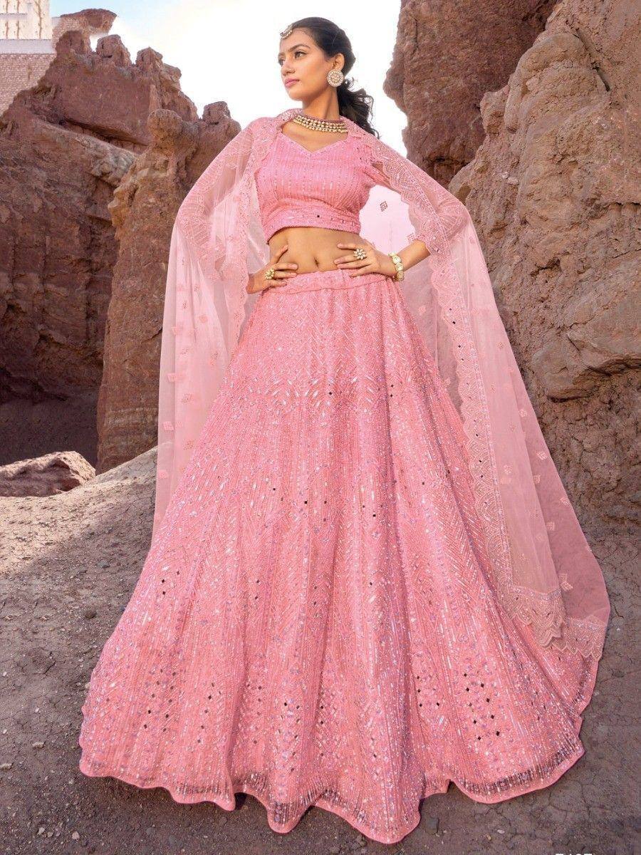 Pink embroidered lehenga choli with sheer dupatta, perfect for Indian weddings and festive occasions
