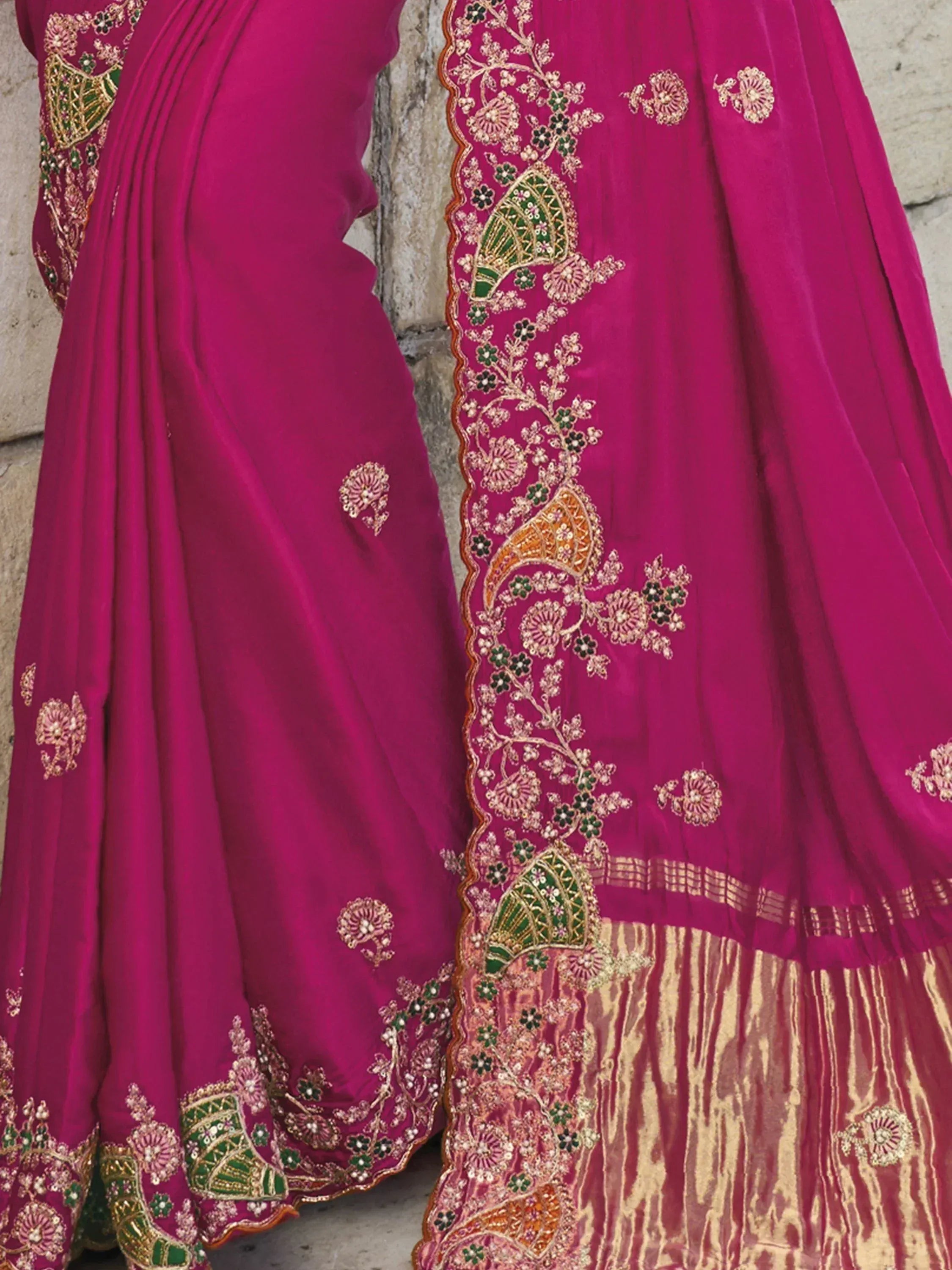 Fuchsia Indian lehenga choli with gold and green floral embroidery, ethnic wear for women