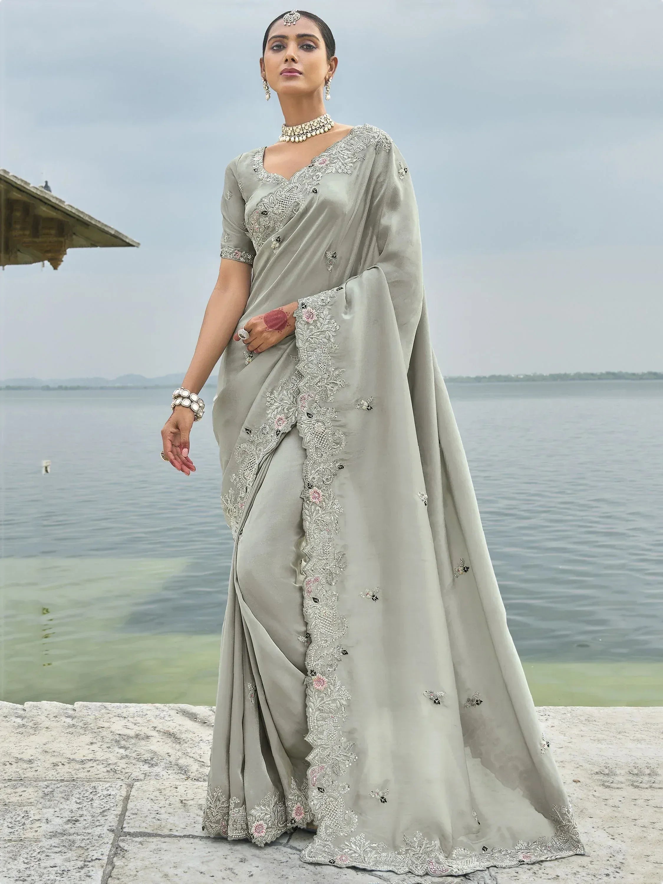 Elegant grey saree with floral embroidery, perfect for Indian ethnic wear occasions
