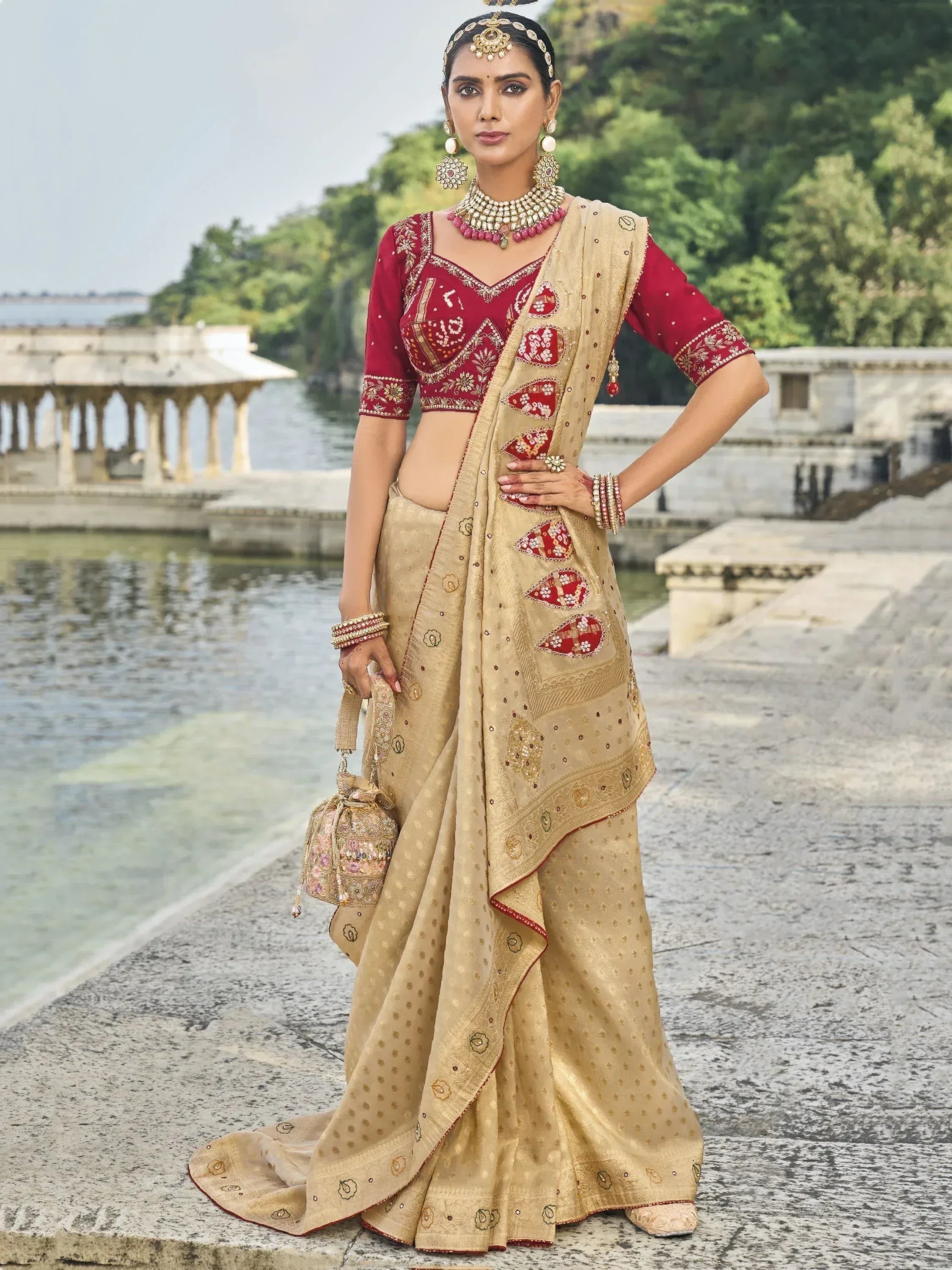 Elegant Indian ethnic wear: maroon and gold embroidered lehenga choli with dupatta, perfect for weddings and festivals.