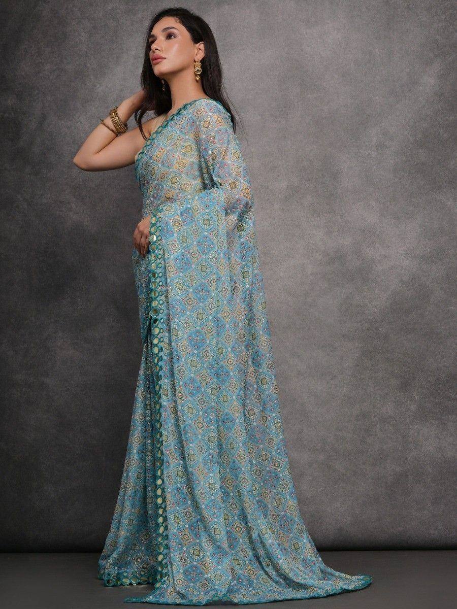 Blue printed saree with gold motifs, elegant ethnic wear for women
