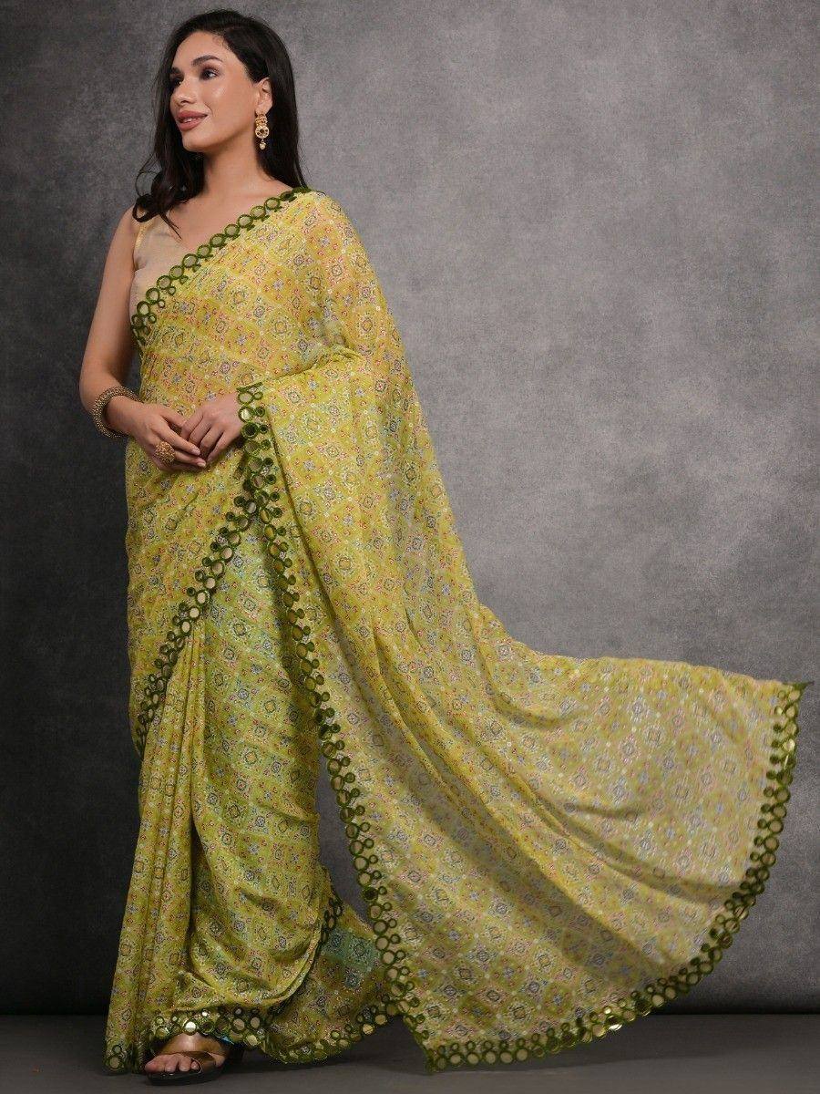 Yellow printed saree with green circular border, ethnic wear for women