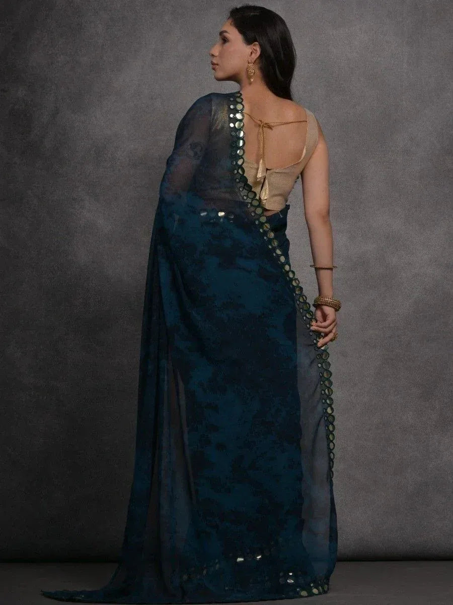 Teal blue saree with mirror work border and gold blouse, elegant ethnic wear for women