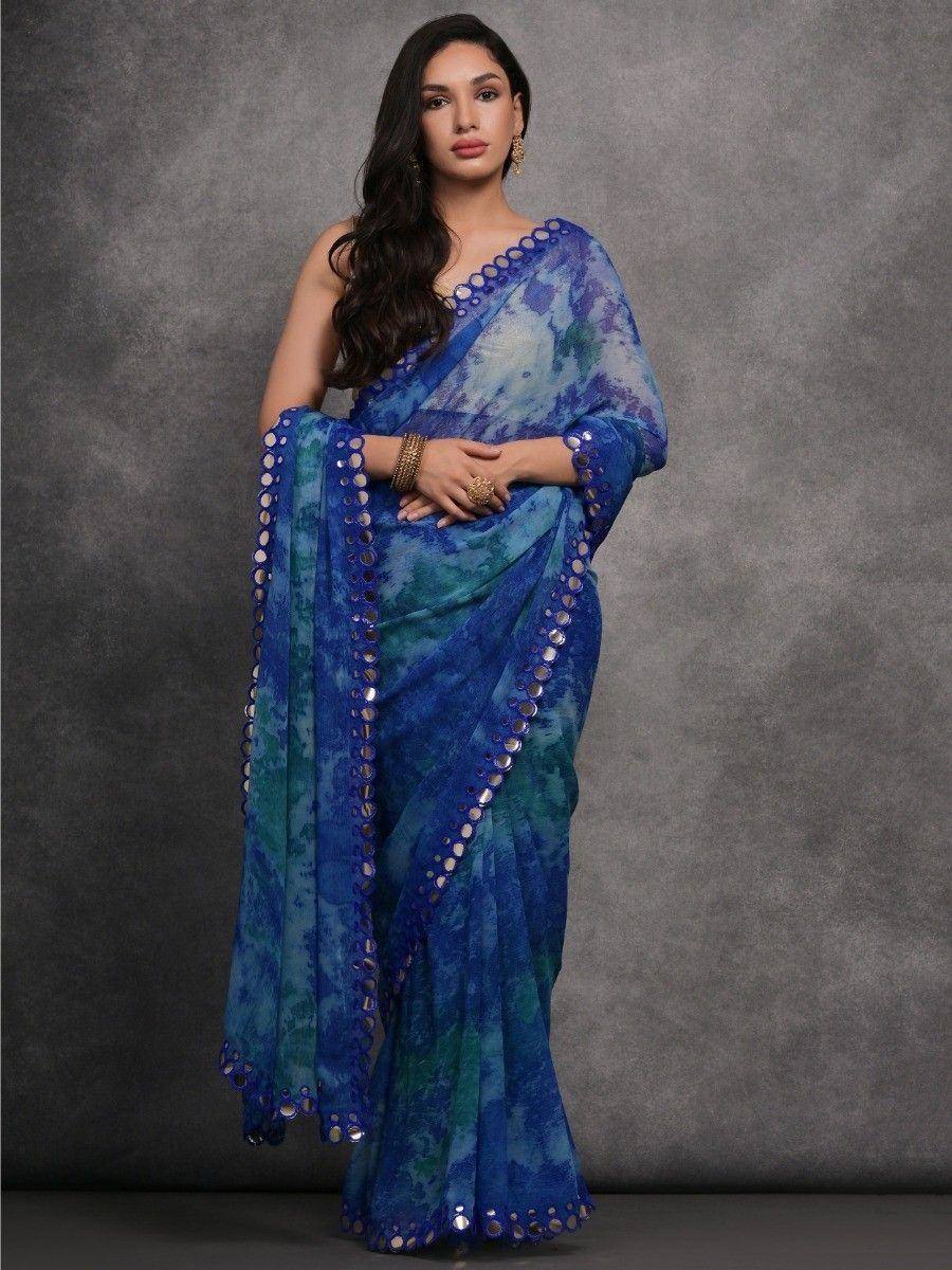 Blue and green tie-dye saree with mirror work, styled for Indian ethnic wear