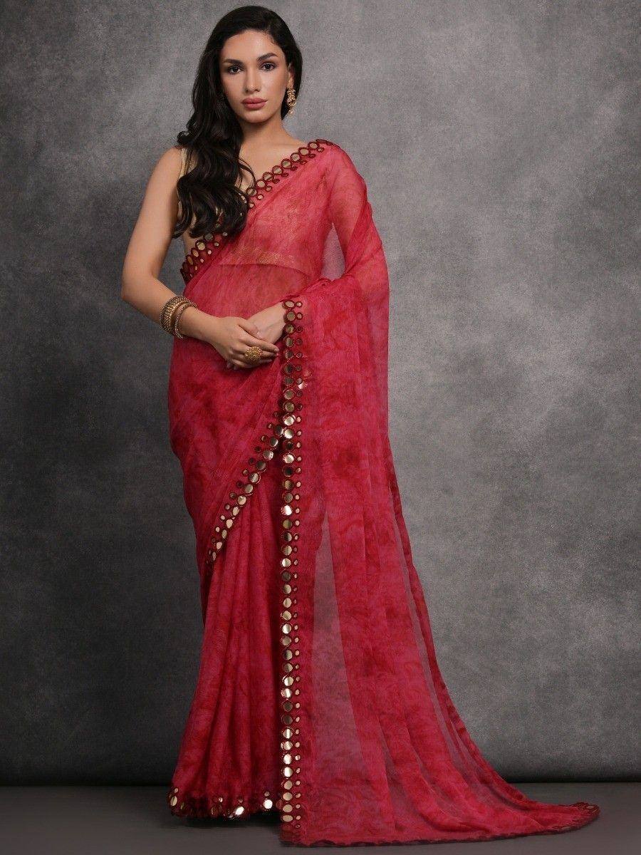 Red ethnic saree with gold mirror work, perfect for Indian weddings and festive occasions