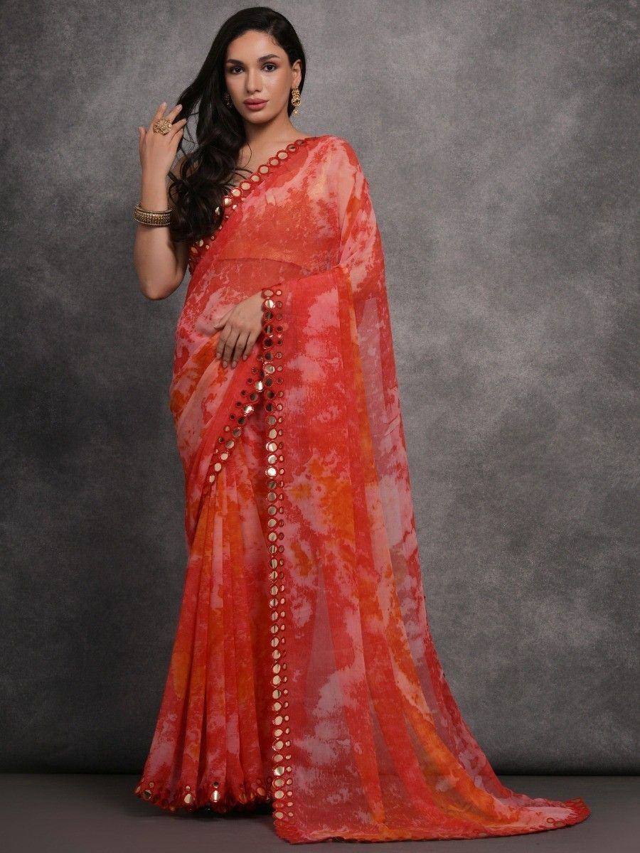 Orange tie-dye saree with mirror work, stylish ethnic wear for women
