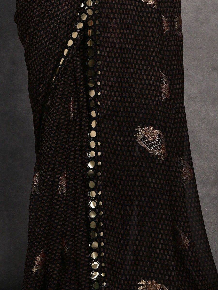 Black ethnic gown with gold mirror work and floral embroidery, perfect for Indian festive wear