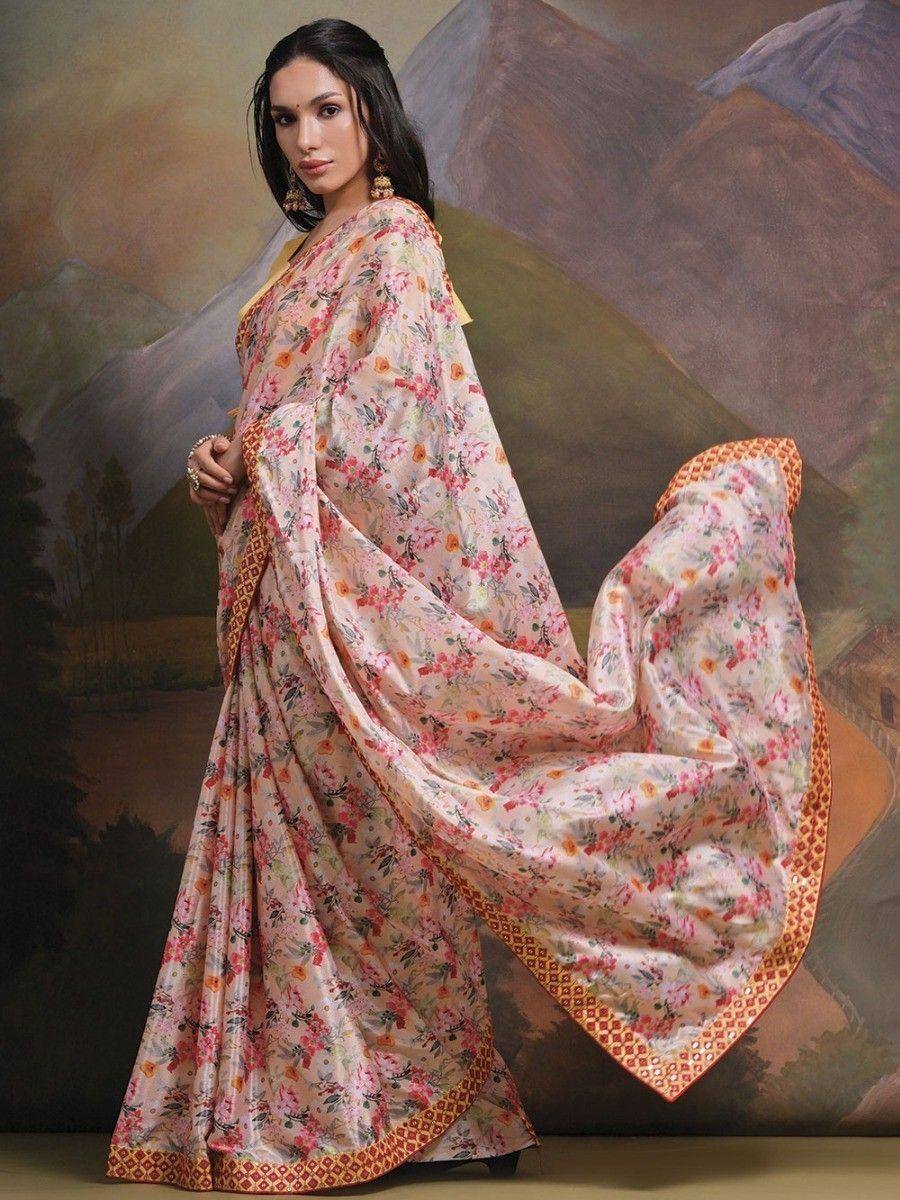 Floral printed saree with orange border, elegant Indian ethnic wear for women