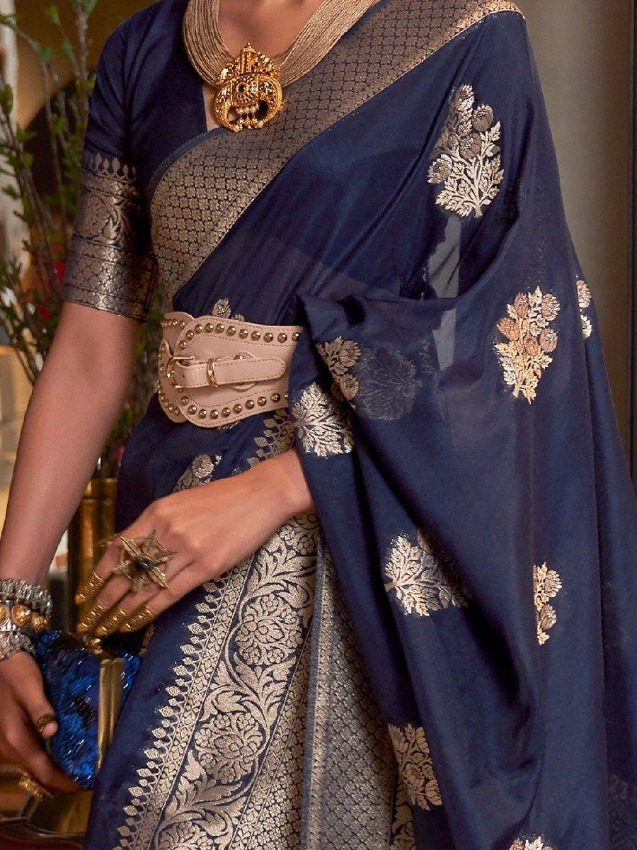 Navy blue saree with gold floral embroidery, paired with designer blouse and statement jewelry for ethnic wear
