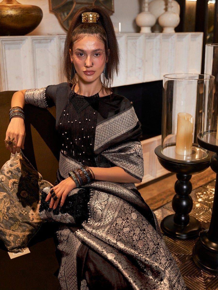 Elegant black and silver ethnic gown with intricate embroidery, perfect for Indian festive occasions.