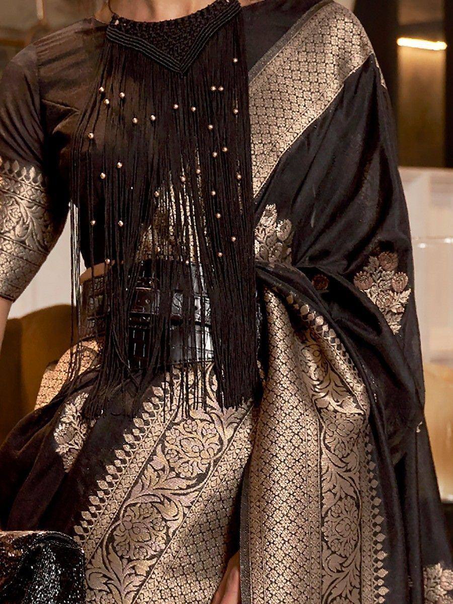 Black and gold ethnic saree with fringed blouse, perfect for festive occasions and Indian weddings.