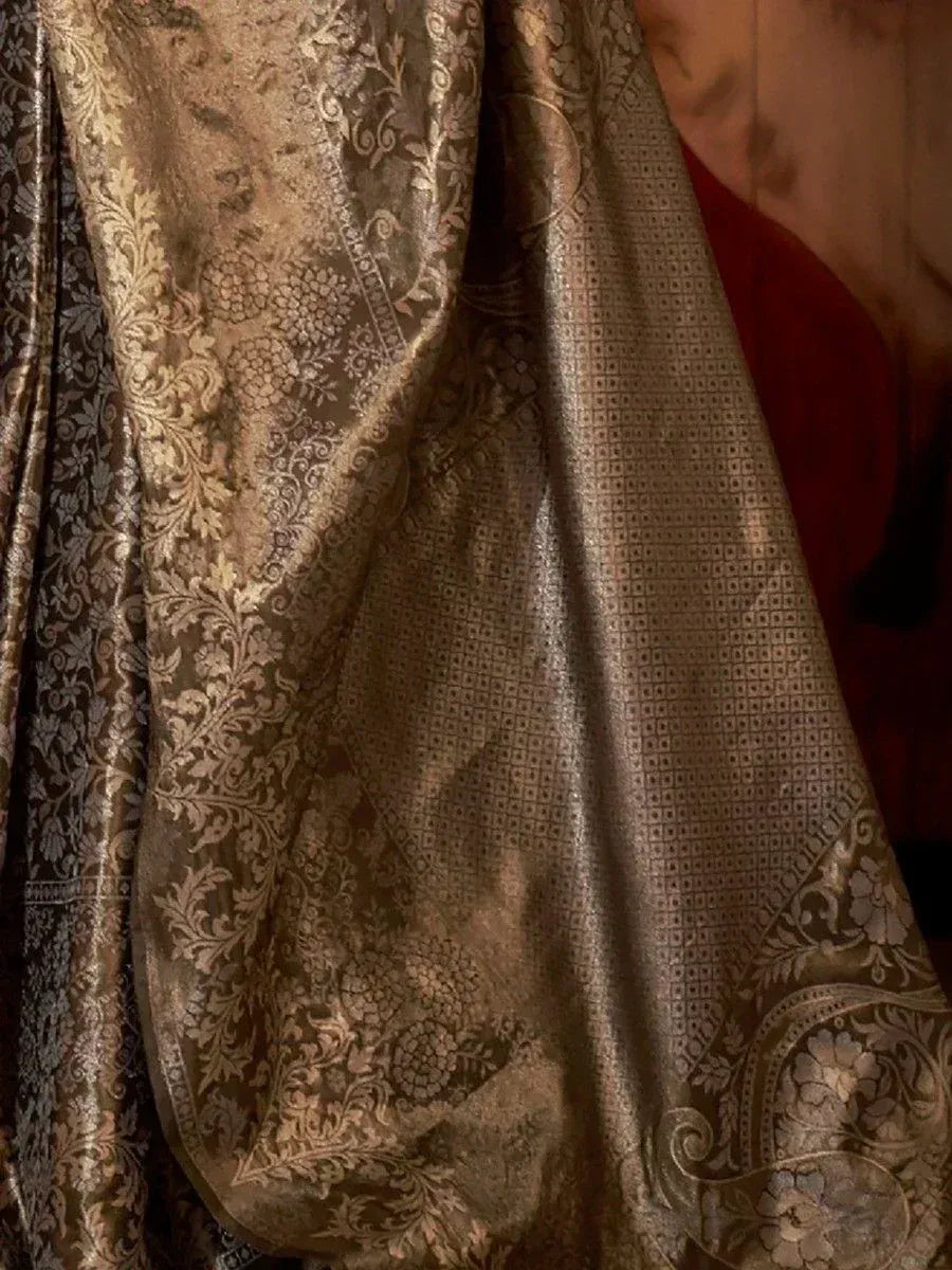 Luxury brown silk saree with intricate floral and paisley embroidery, perfect for ethnic wear occasions.