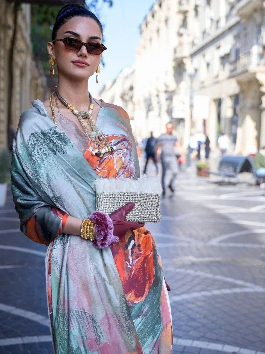 Woman in vibrant printed ethnic gown with statement jewelry, styled for street fashion