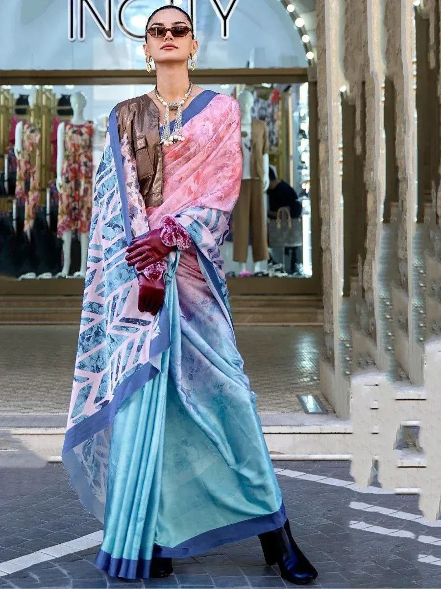 Stylish woman in printed blue and pink saree with modern blouse, perfect for ethnic occasions