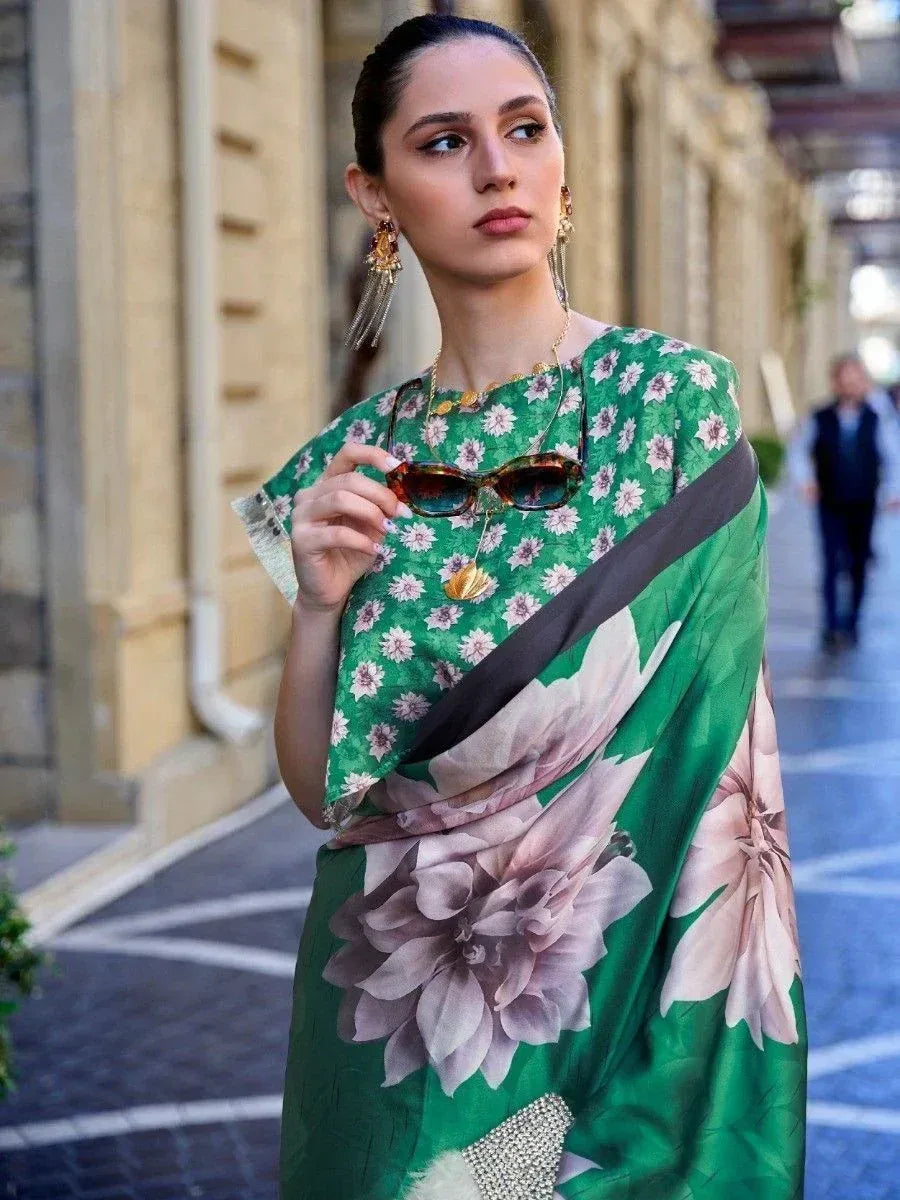Green floral saree with pink blooms, stylish ethnic wear for women, perfect for festive occasions