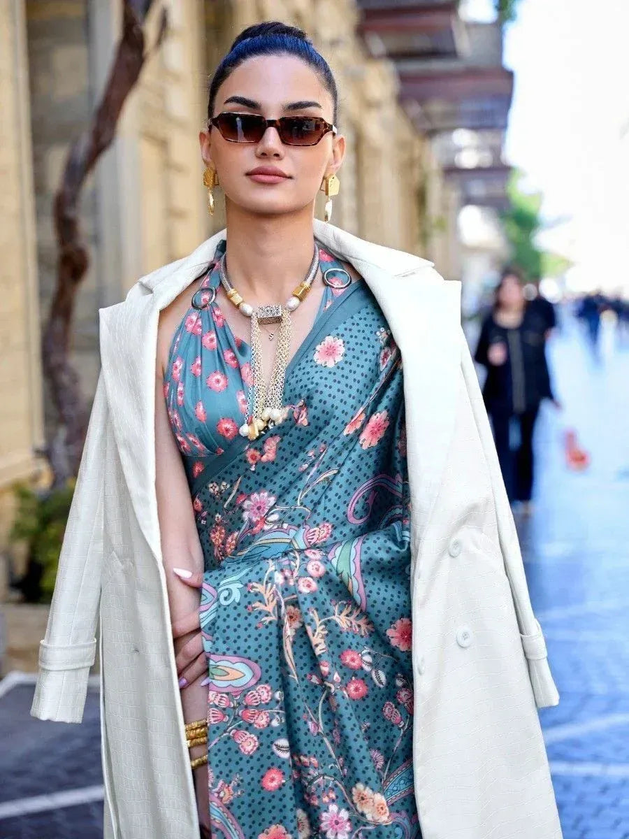 Floral print ethnic gown with polka dots, layered necklace, and cream coat for stylish streetwear look