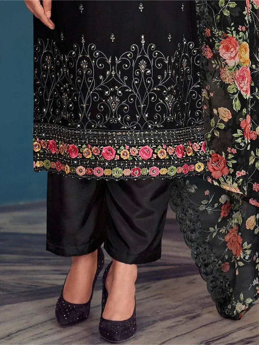 Black embroidered salwar kameez with floral dupatta, perfect for ethnic occasions