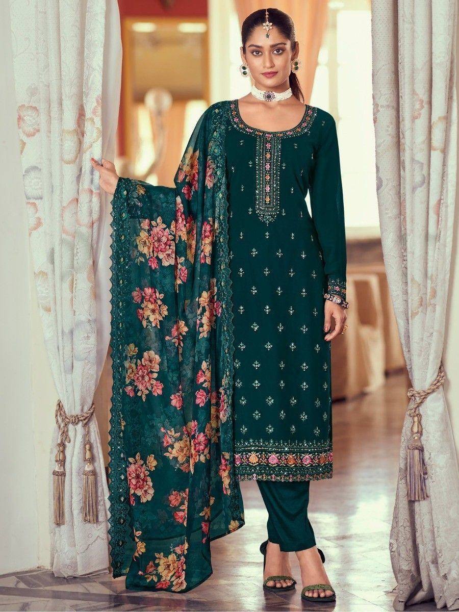 Emerald green embroidered salwar kameez with floral dupatta, perfect for Indian ethnic wear occasions.