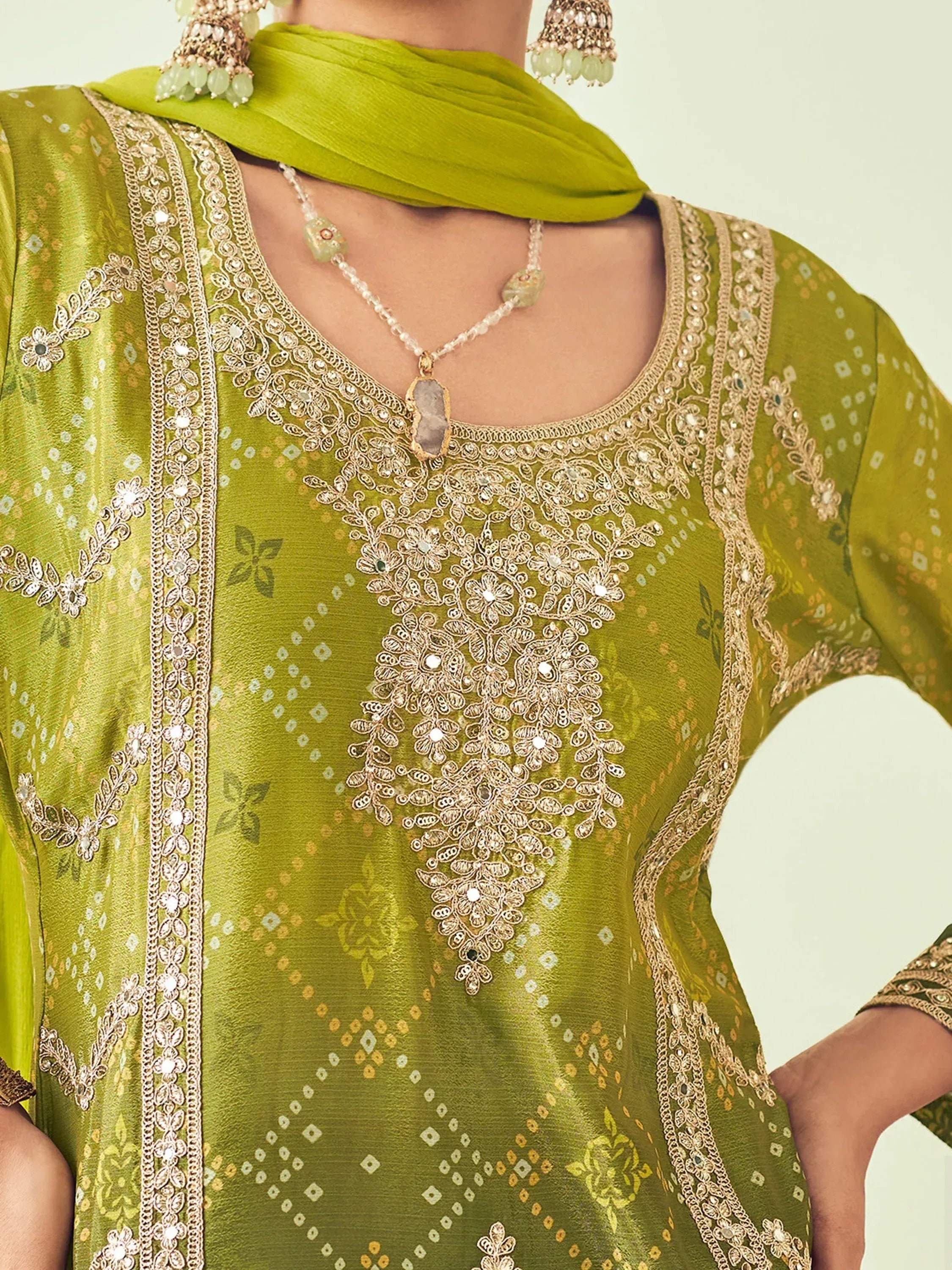 Olive green ethnic kurti with gold embroidery, mirror work, and matching dupatta for Indian wear