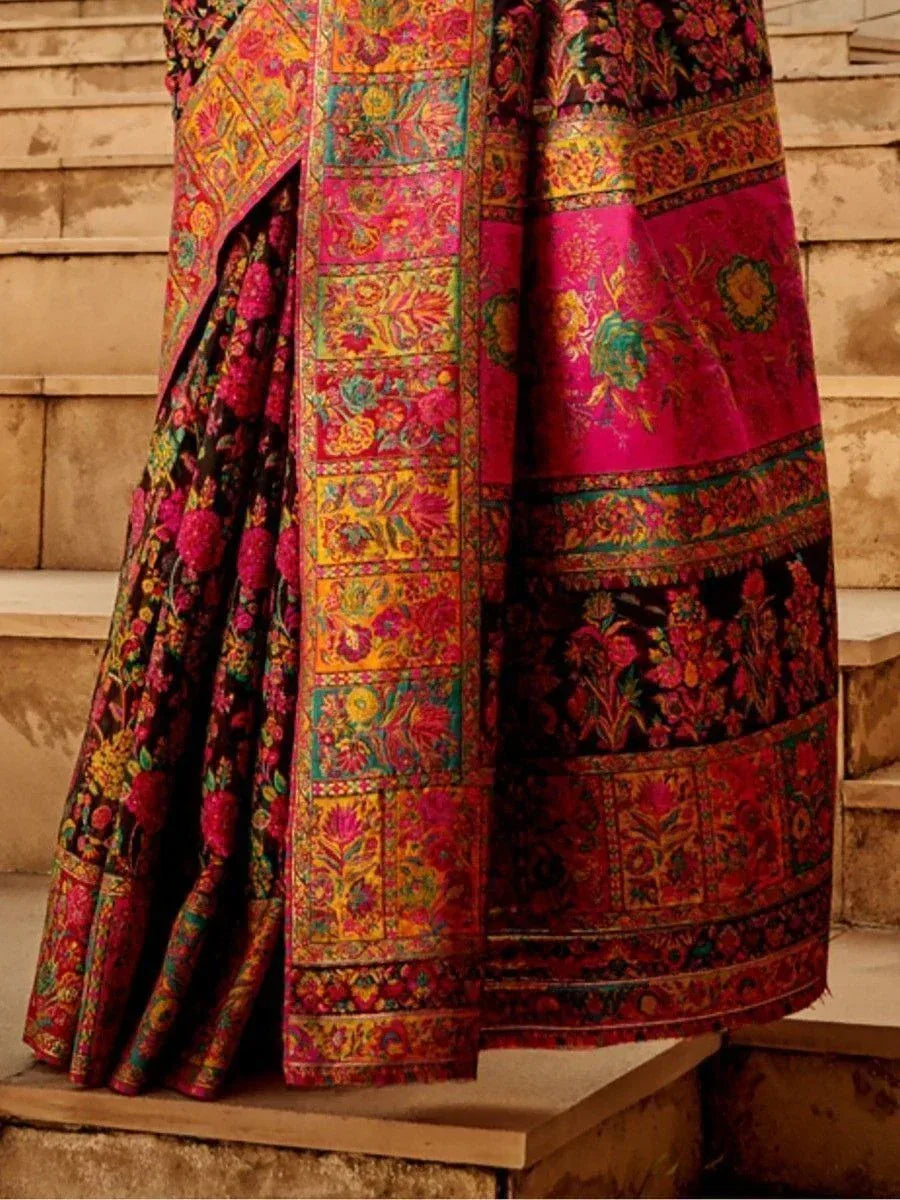 Vibrant floral printed Indian saree with rich embroidery, perfect for ethnic occasions