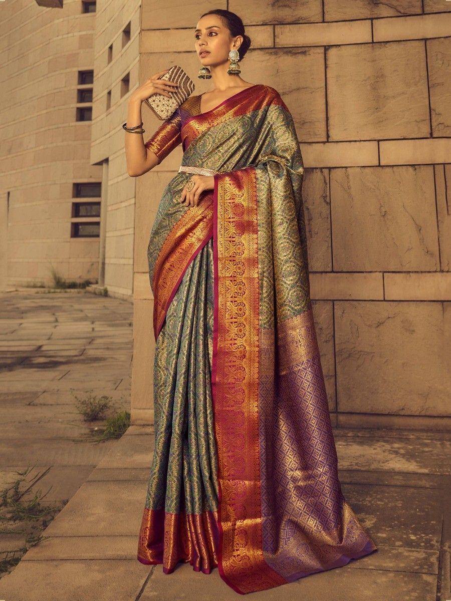 Elegant Indian saree with gold zari border, perfect for weddings and festivals