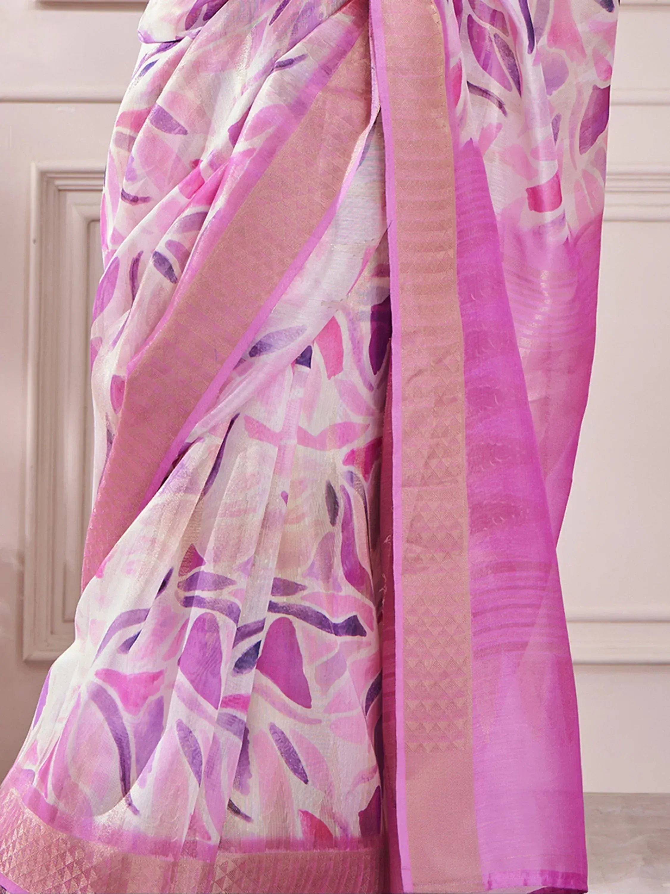 Pink and purple floral printed saree with woven border, ideal for Indian ethnic wear