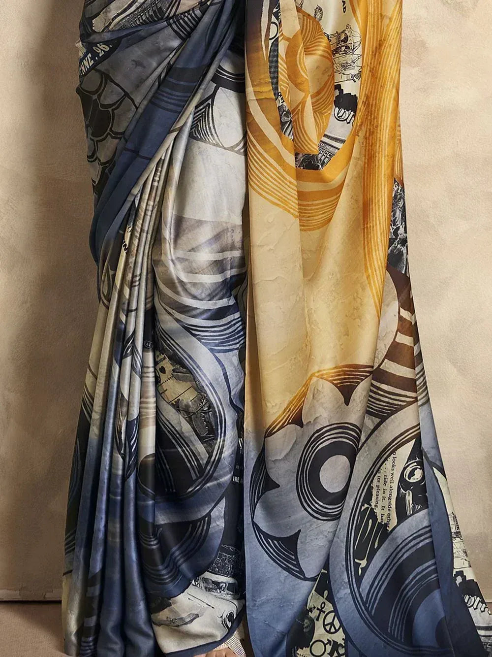 Abstract printed saree in blue and mustard, stylish ethnic wear for women