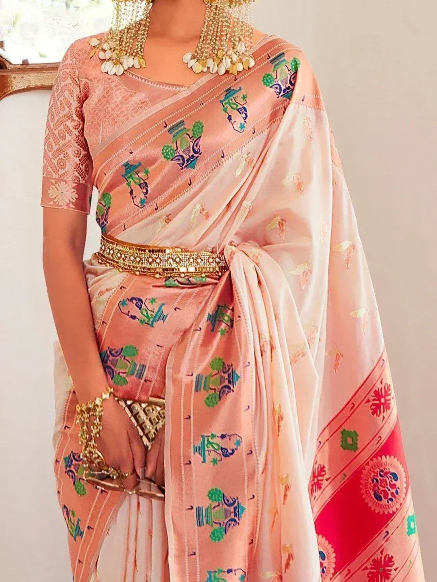 Pink printed saree with temple motifs, gold belt, and traditional jewelry for ethnic wear