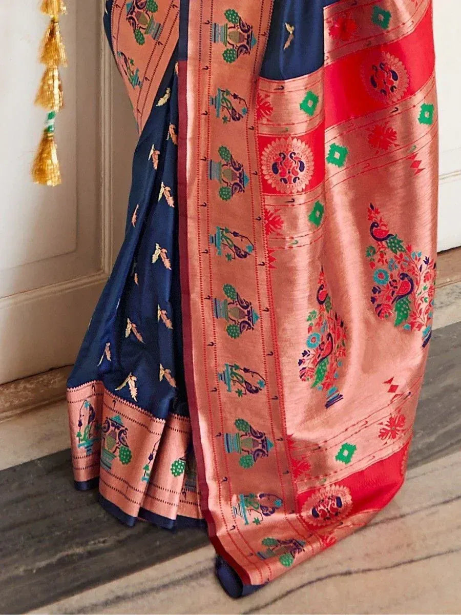 Blue and peach silk saree with peacock and temple motifs, perfect for Indian ethnic wear occasions
