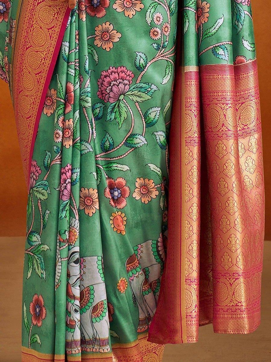 Green floral print saree with elephant motifs and golden border, Indian ethnic wear