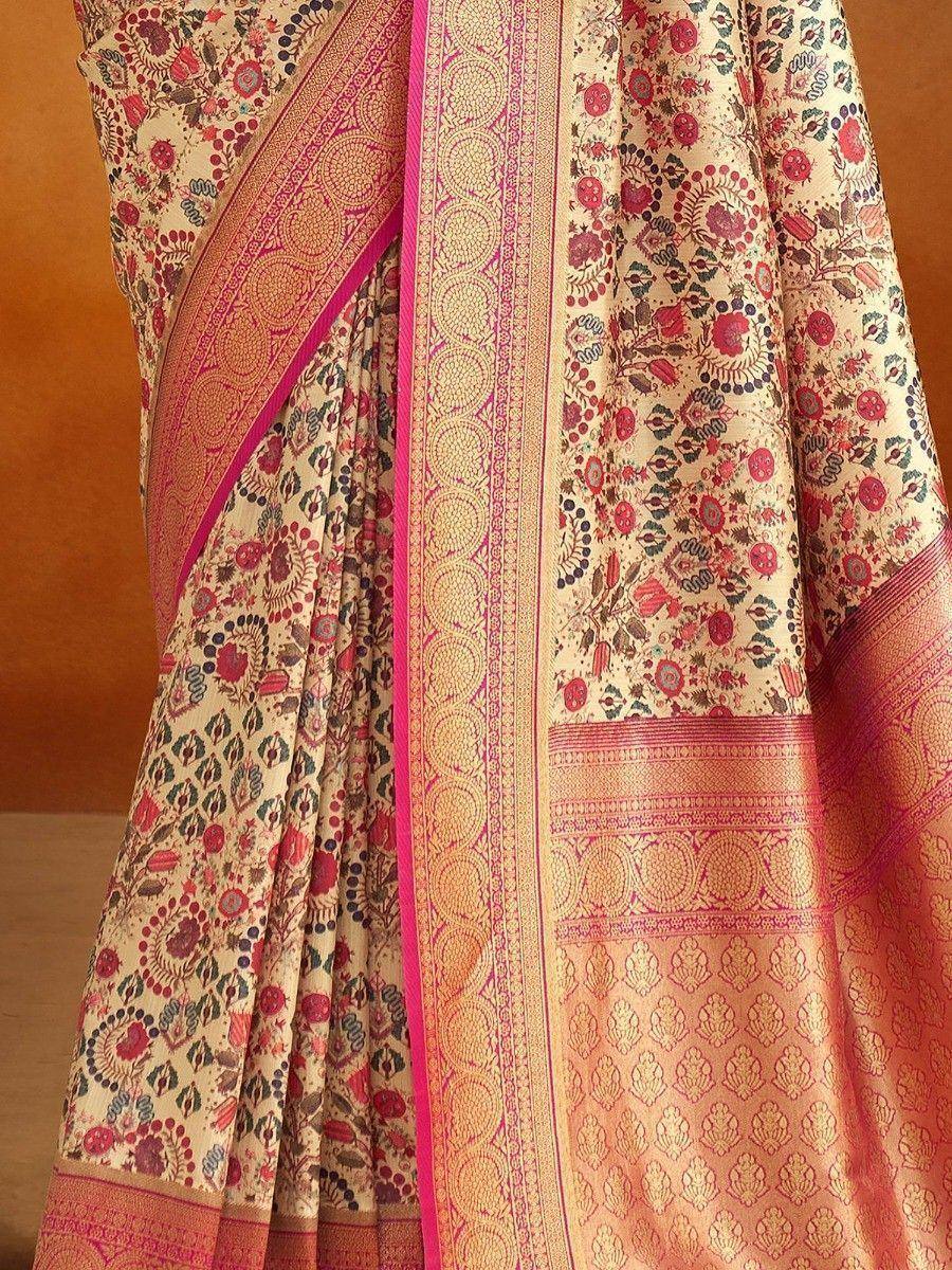 Elegant floral print saree with pink and gold border, perfect for Indian ethnic wear occasions
