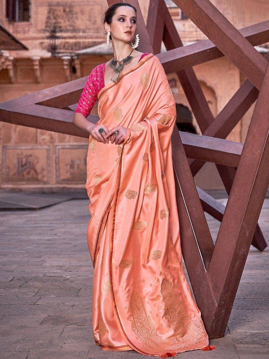 Peach silk saree with gold embroidery, paired with pink blouse, perfect for Indian ethnic wear occasions