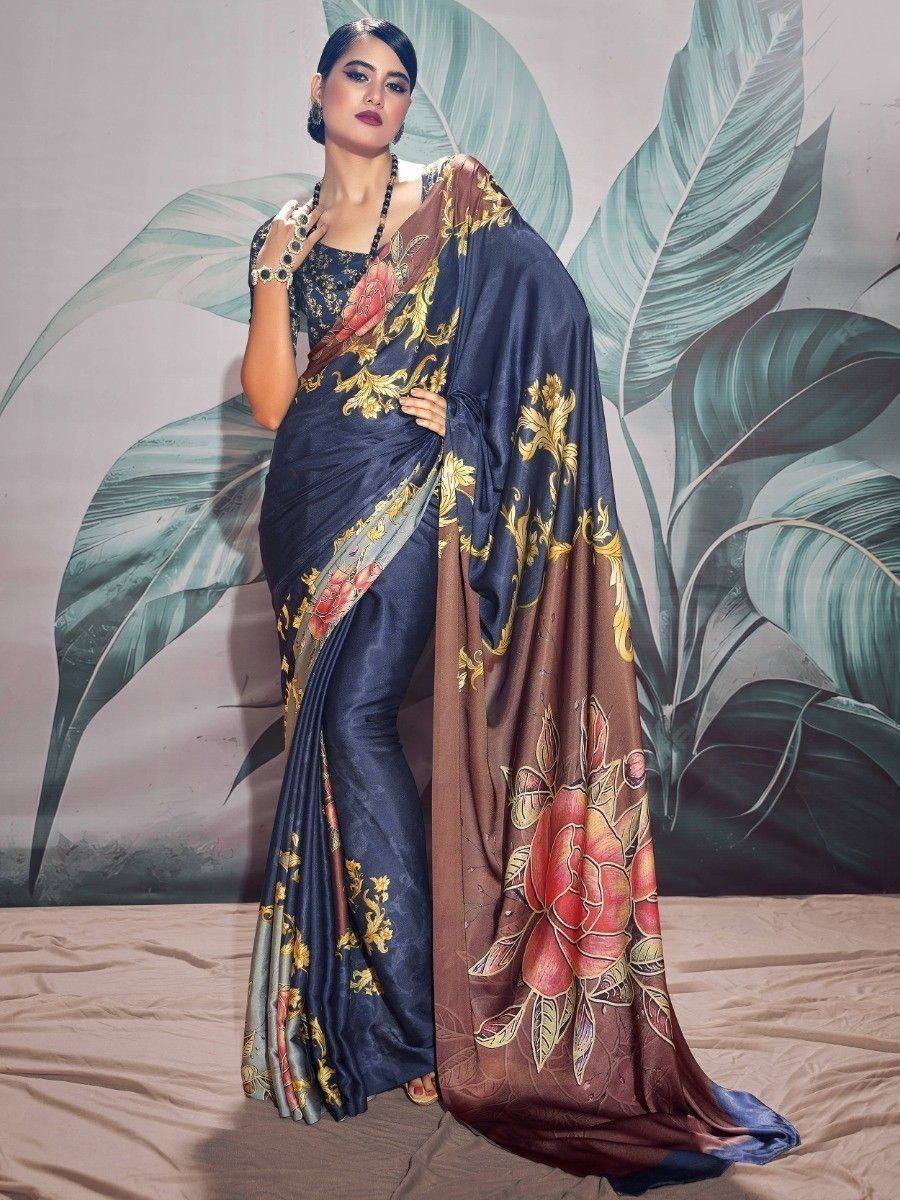 Elegant navy blue saree with gold floral print and contrasting brown pallu, perfect for Indian ethnic occasions.