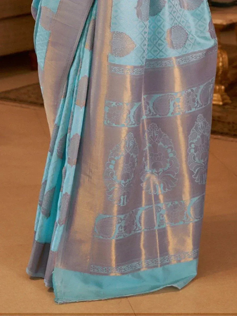 Blue and silver designer saree with intricate floral and geometric patterns, perfect for ethnic occasions.