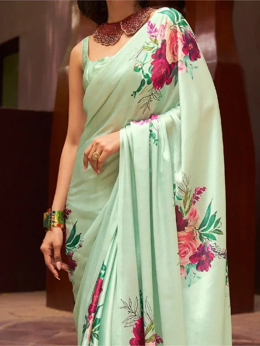 Mint green floral saree with vibrant rose print, perfect for ethnic occasions and Indian wear